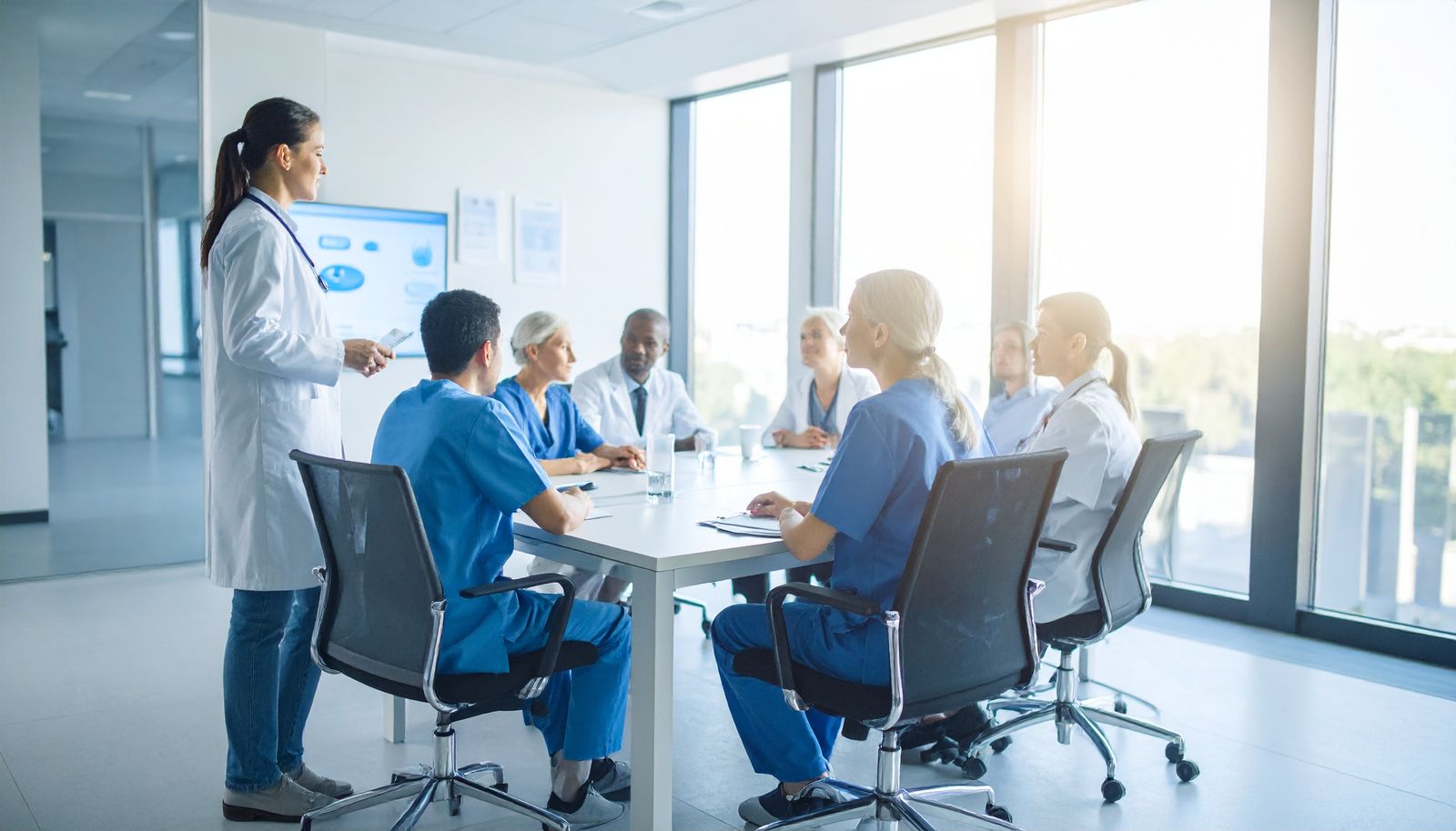 Medical team in technology planning meeting - healthcare IT consulting