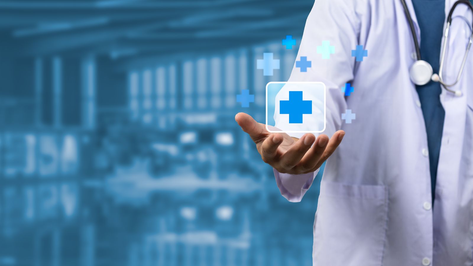 Doctor with virtual healthcare technology icons - healthcare technology solutions