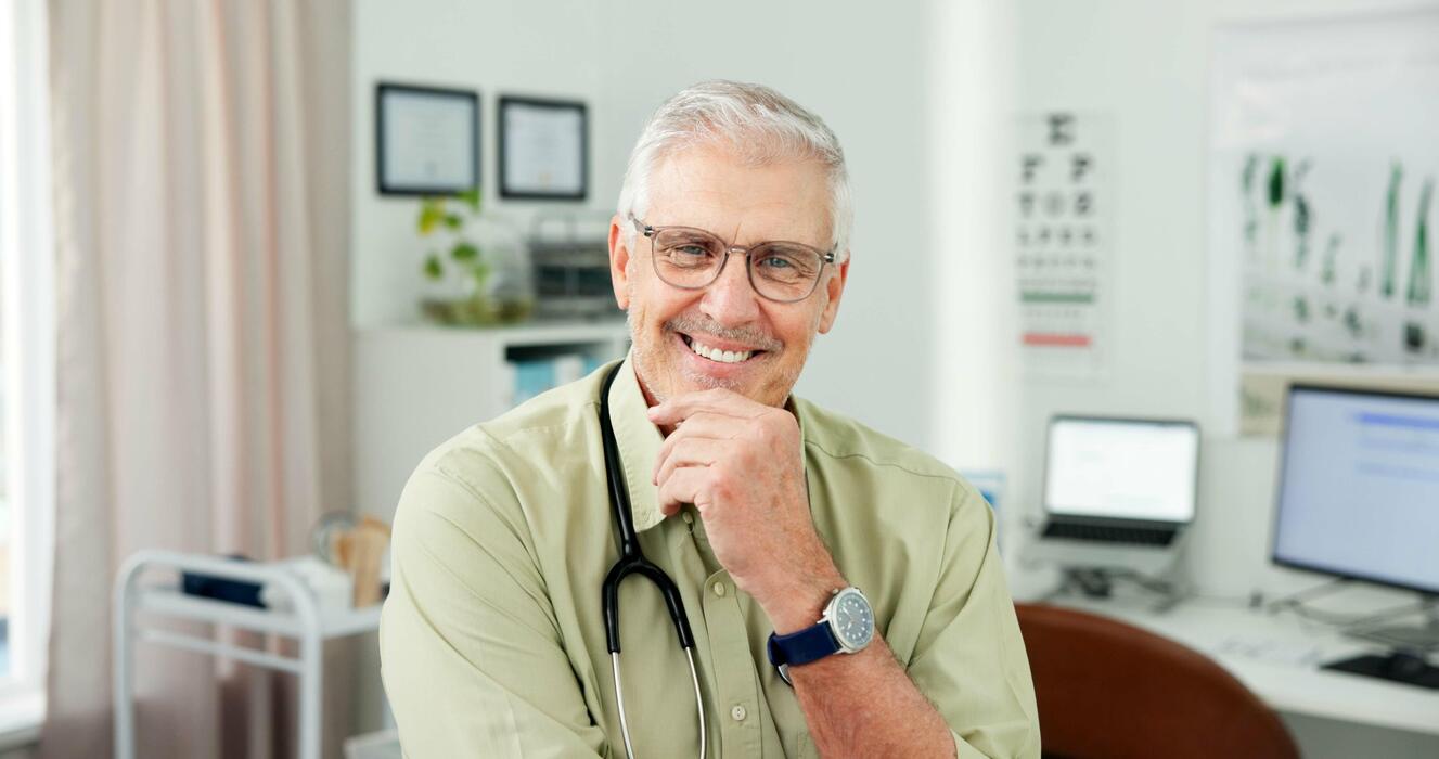 Mature man meeting with a doctor at a men's health clinic appointment