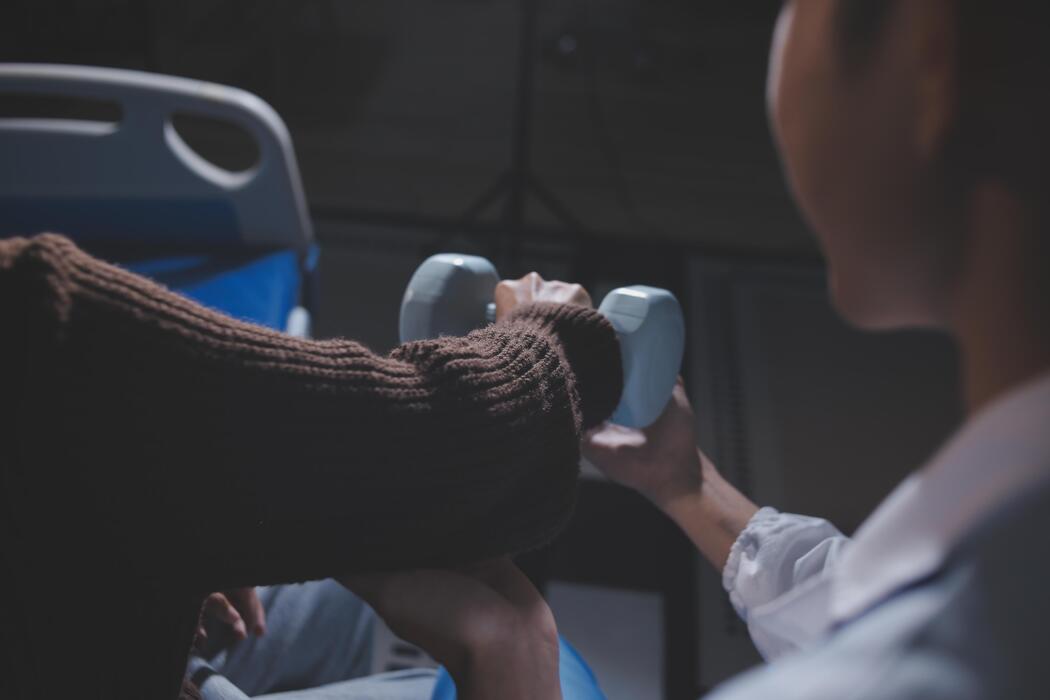 Patient performing guided strengthening exercises during outpatient rehabilitation at a rehabilitation center