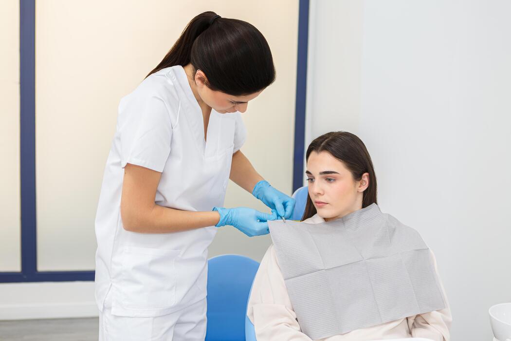 Sedation Dentistry Patient Preparation Dentist preparing a patient for a sedation dentistry procedure