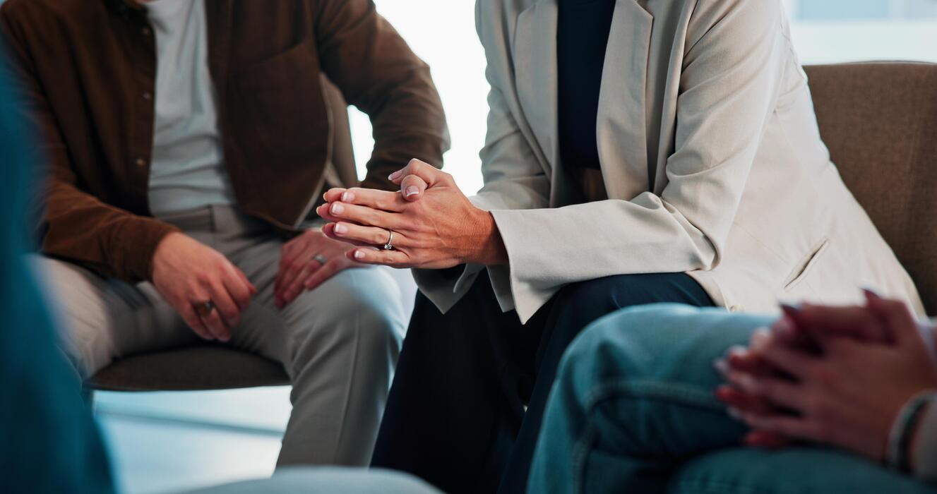 Social Work Counseling Session Clinical social worker leading a supportive counseling session with clients