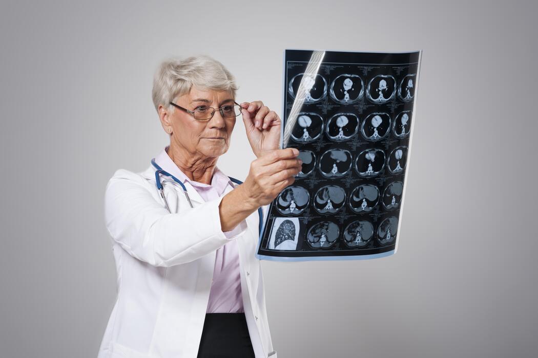 Radiologist reviewing an MRI scan for remote interpretation