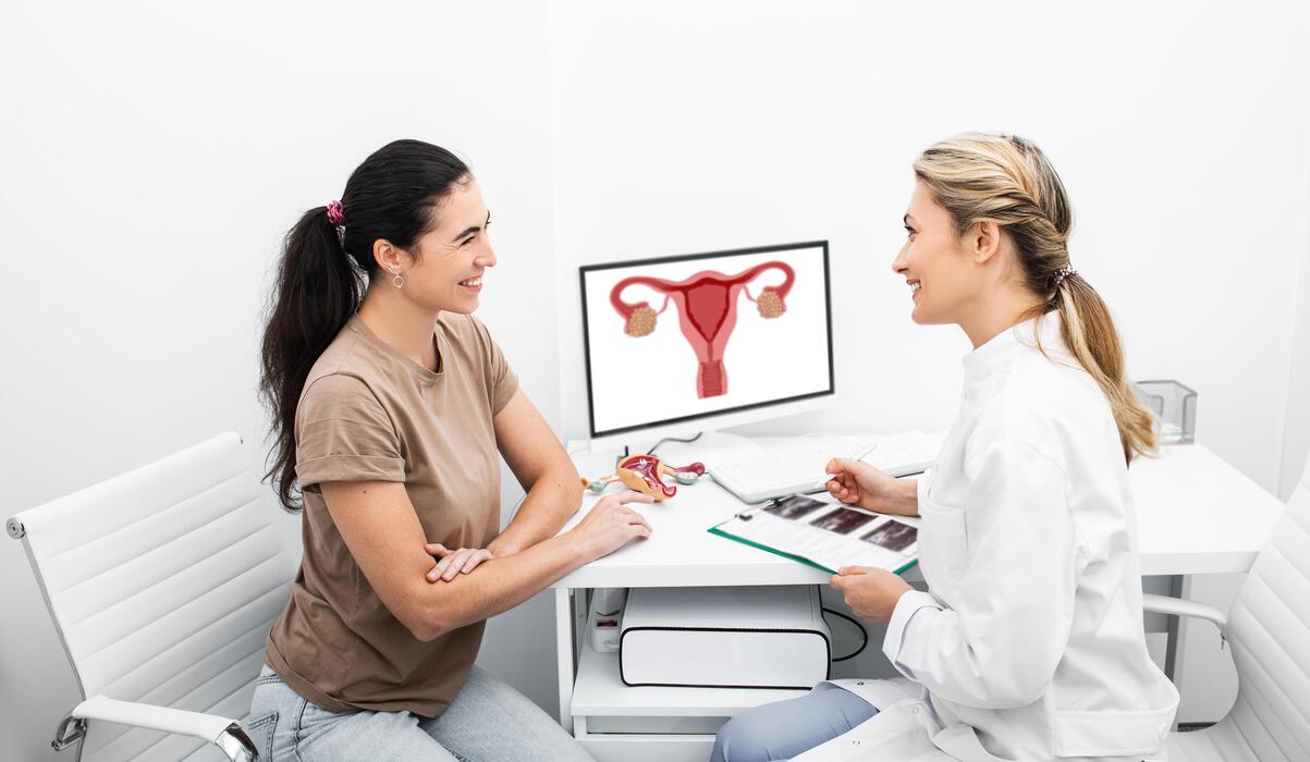 Urogynecology Patient Consultation Gynecologist consulting with a patient about pelvic health